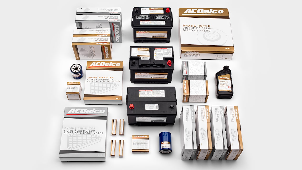 Various GM Genuine and ACDelco Gold Parts Laying on a Table