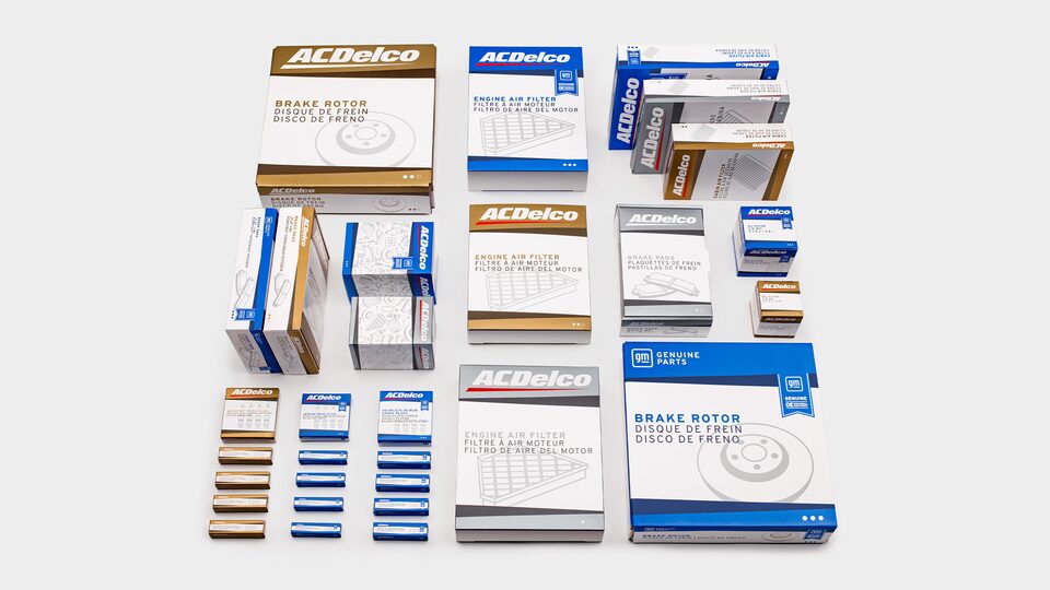 Various GM Genuine and ACDelco OE Parts Laying on a Table
