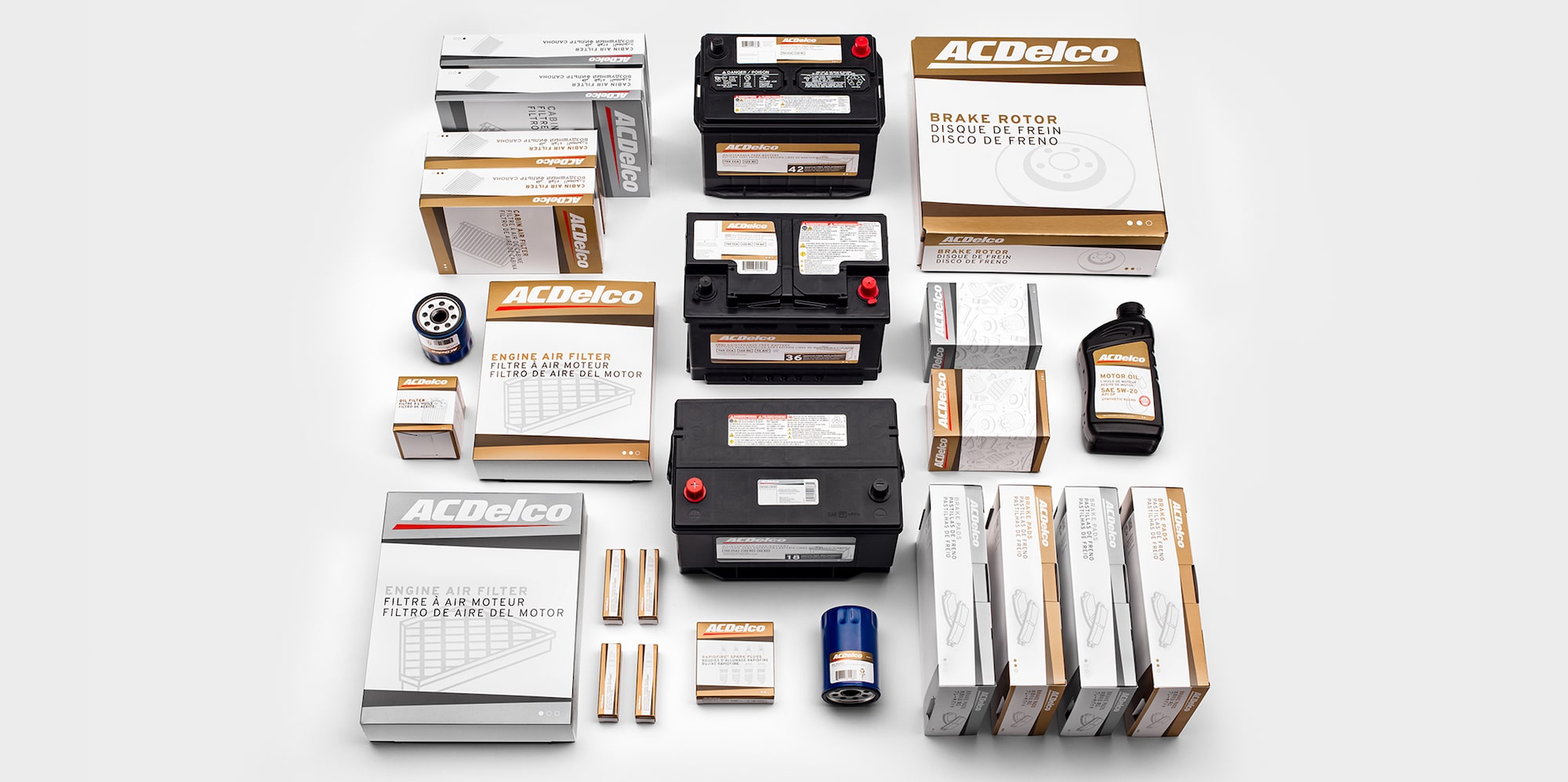 An Above View of a Range of ACDelco Aftermarket Parts, Products, and Supplies Spread Out and Organized Neatly.