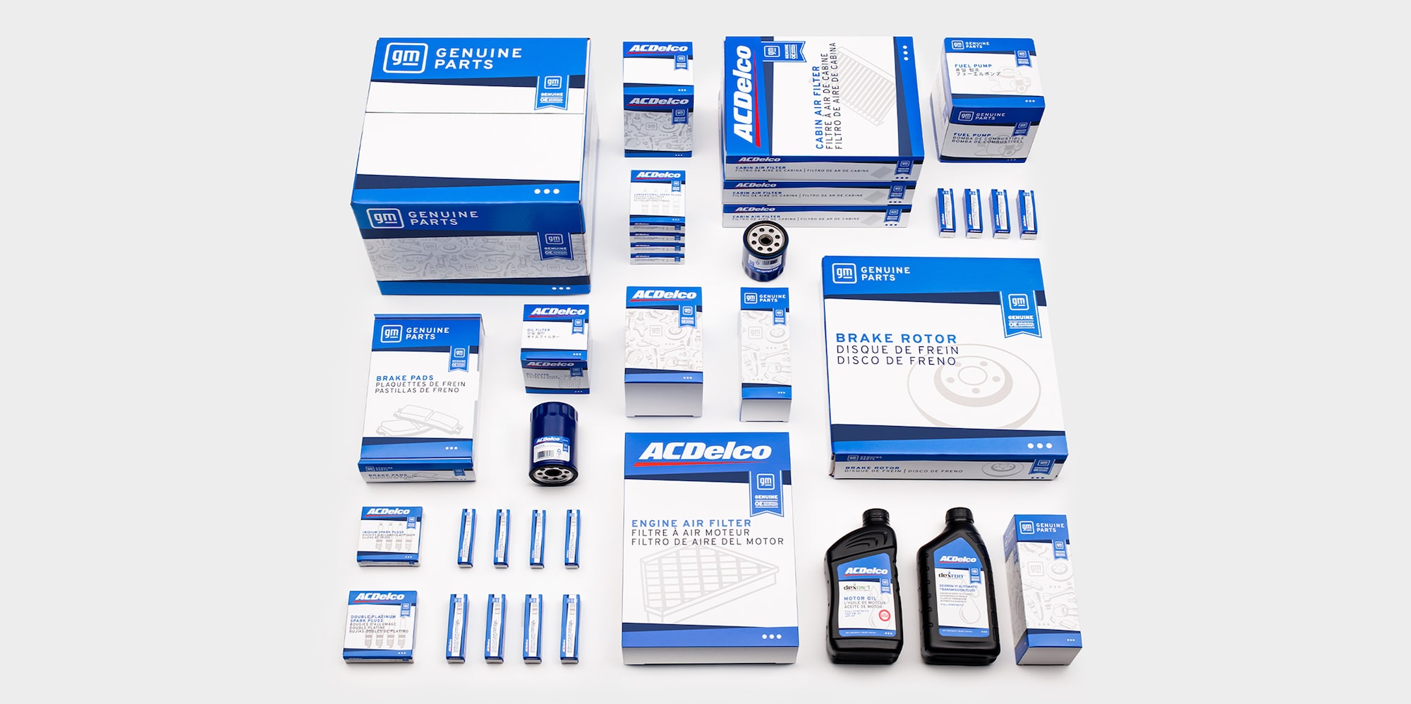 An Above View of a Range of ACDelco GM OE Parts, Products, and Supplies Spread Out and Organized Neatly.