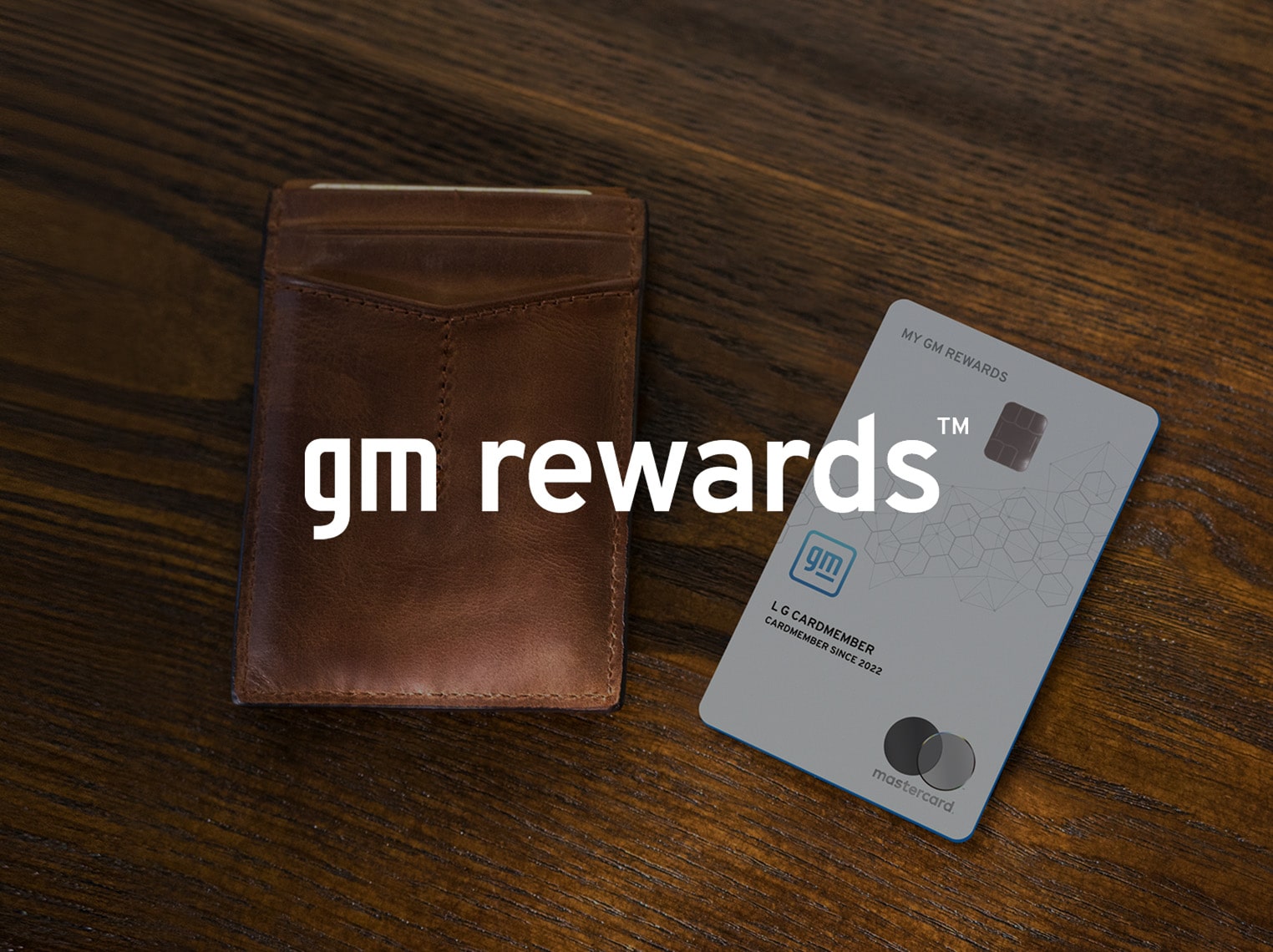 GM Rewards Credit Card Next To A Leather Wallet