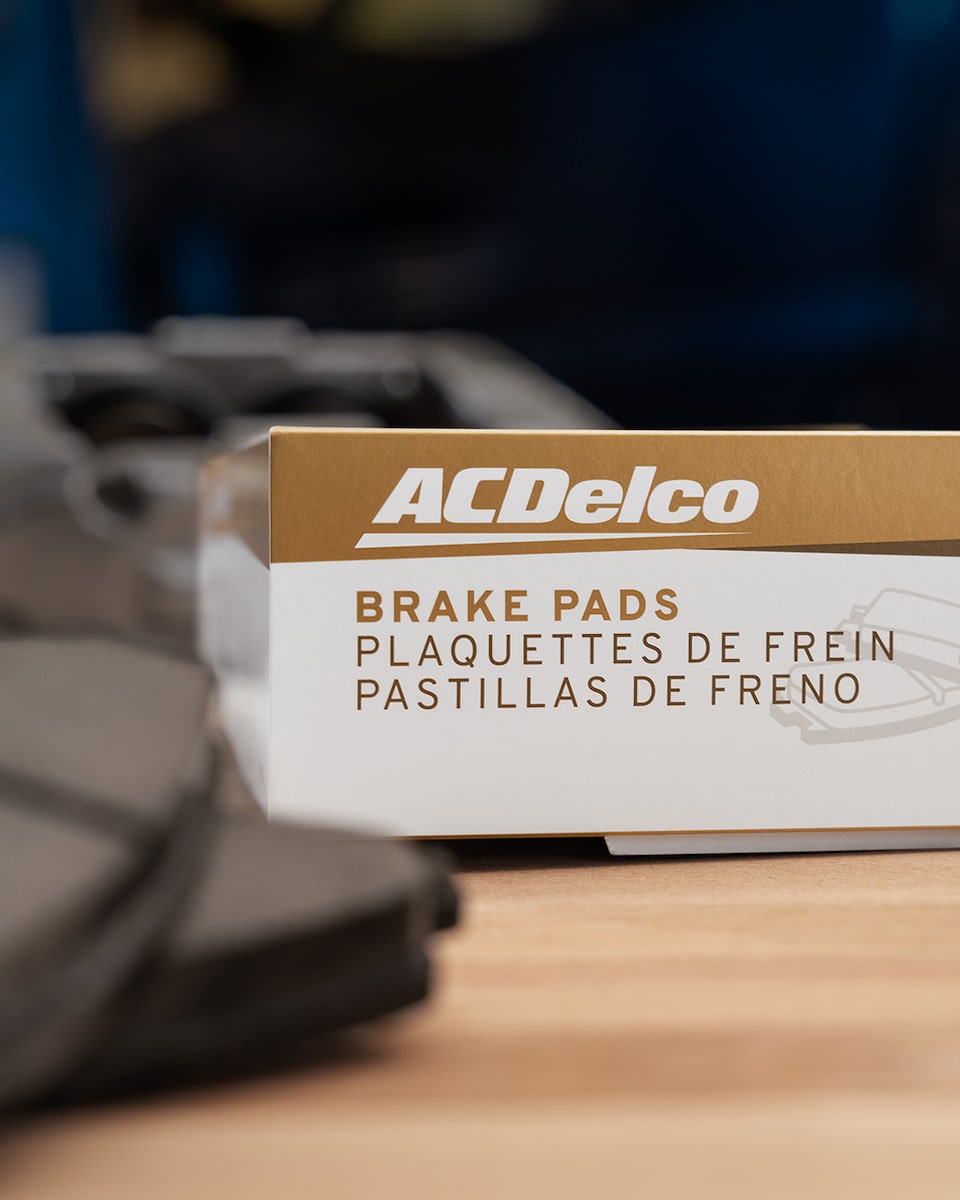 ACDelco Gold Brake Pads Lying on a Work Bench