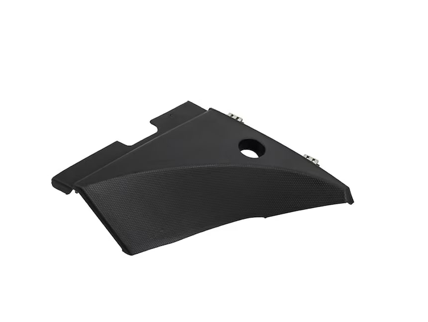 A Black Vehicle Trim Panel with a Hole and Angled Design