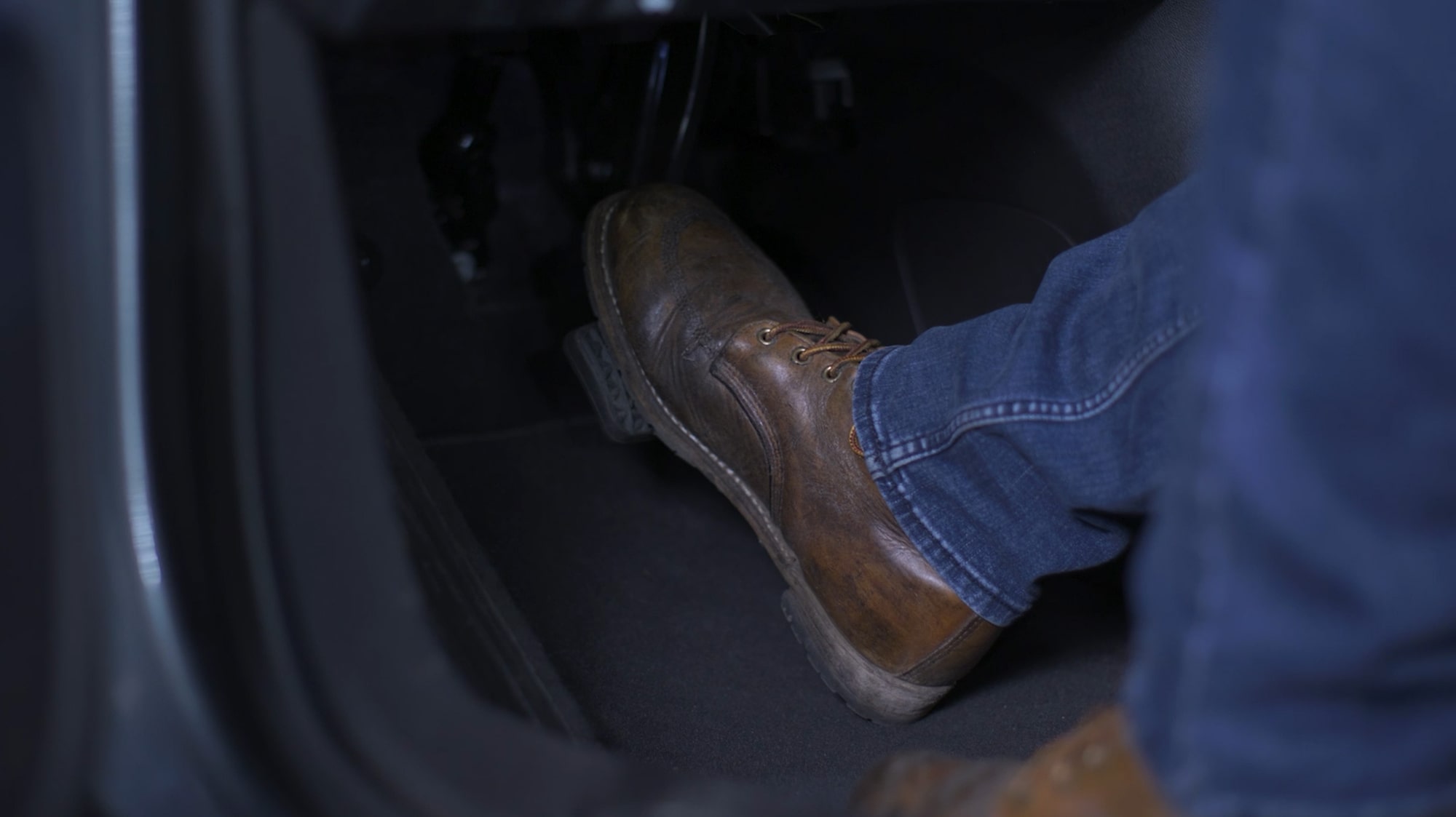 Close-up of a Foot on the Brake in a Vehicle