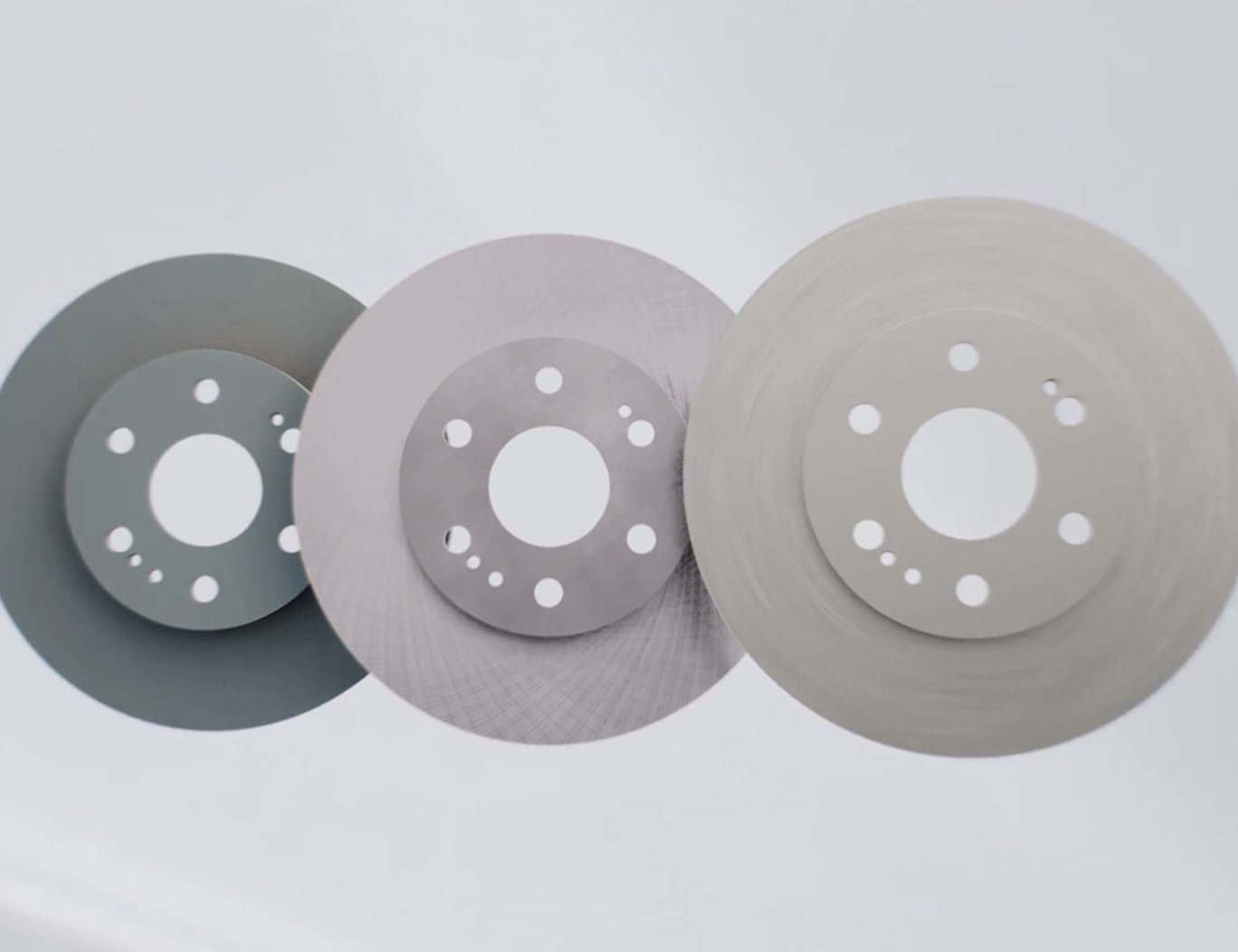 Video Thumbnail Close-up of Three Brake Rotors Displayed Side by Side