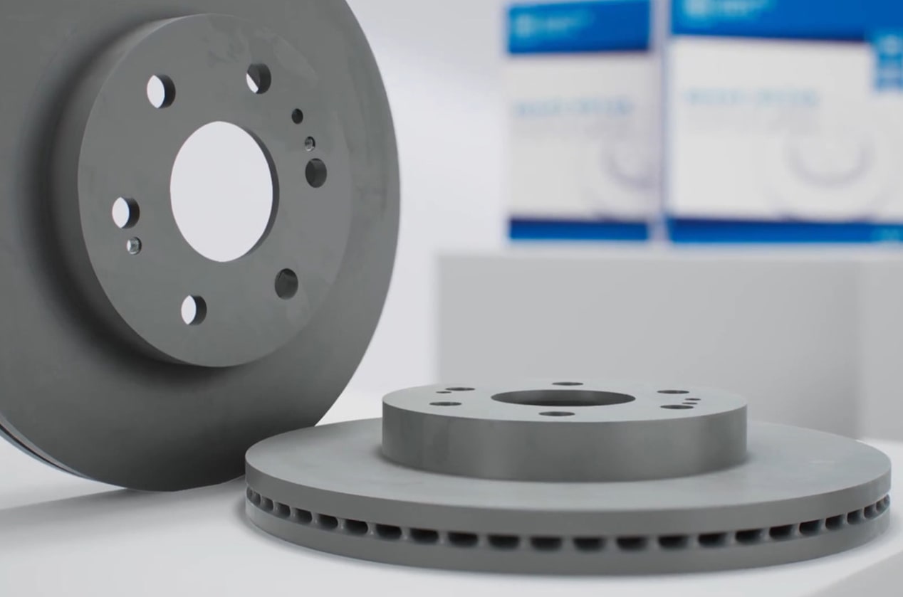 Video Thumbnail Close-up of Two GM Genuine Parts Brake Rotors Displayed on a Table