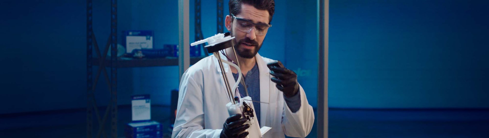 Video Thumbnail of A Man in a Lab Coat Inspecting an Auto Part