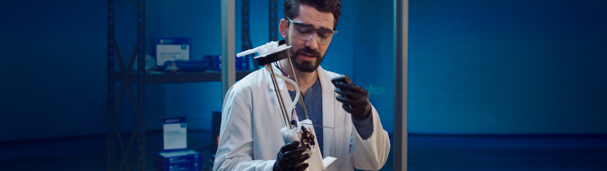 Video Thumbnail of A Man in a Lab Coat Inspecting an Auto Part