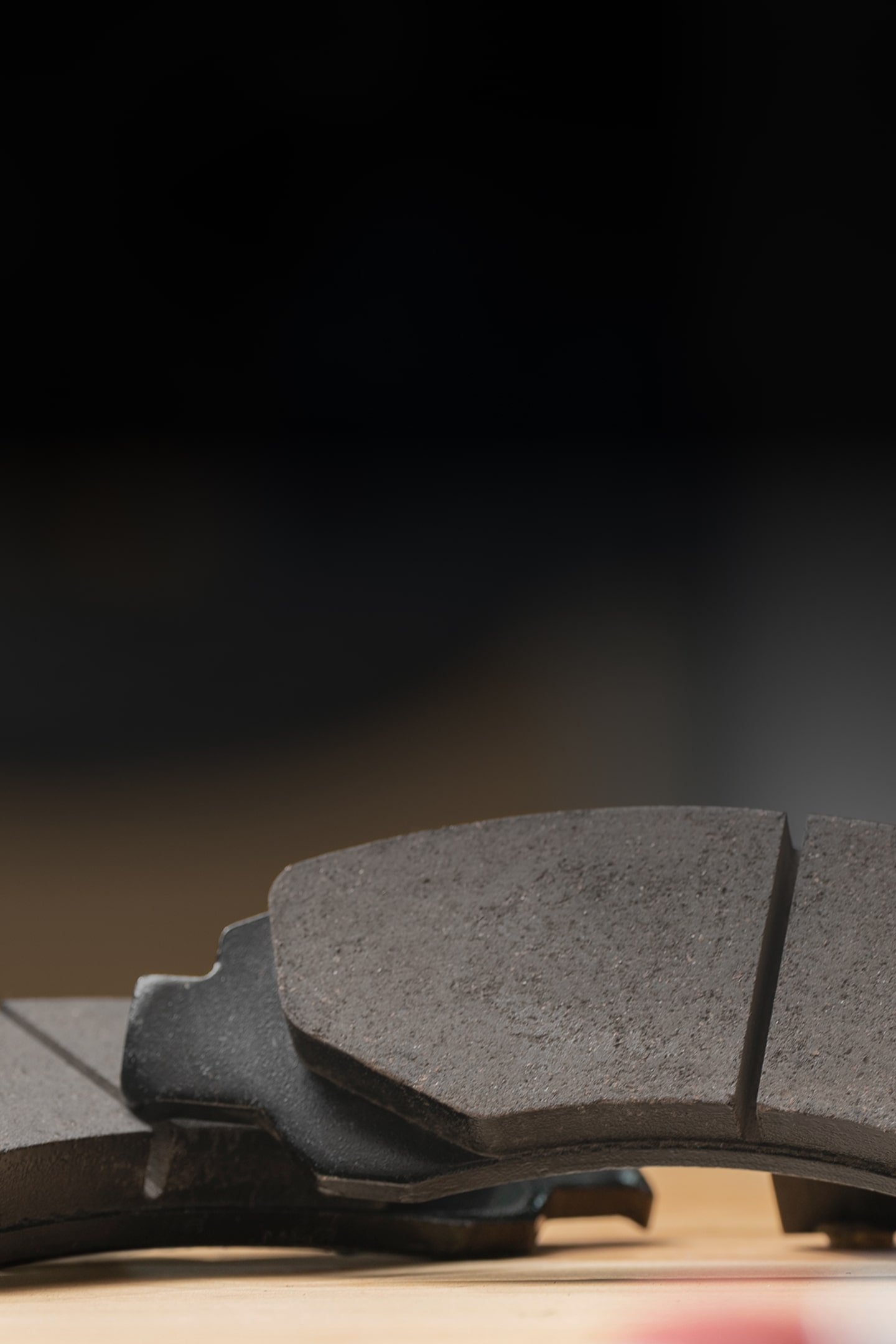 A Pair of Replacement Upgraded Disc Brake Pads On a Work Bench