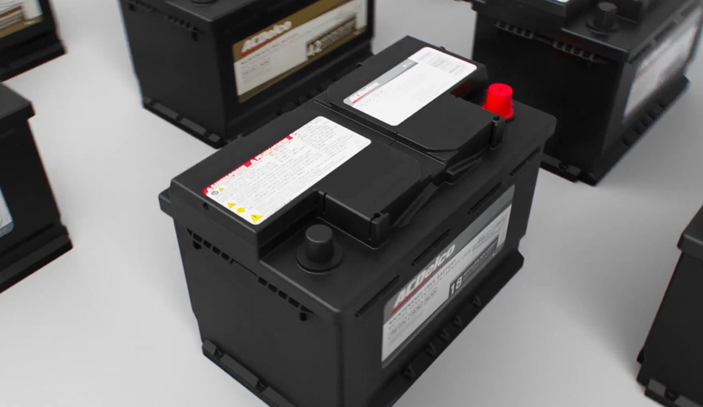 Multiple ACDelco Batteries Organized in Rows on a Tabletop