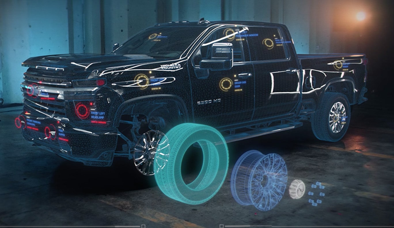A Chevrolet Silverado Heavy Duty Truck on Display With a Wheel Graphic