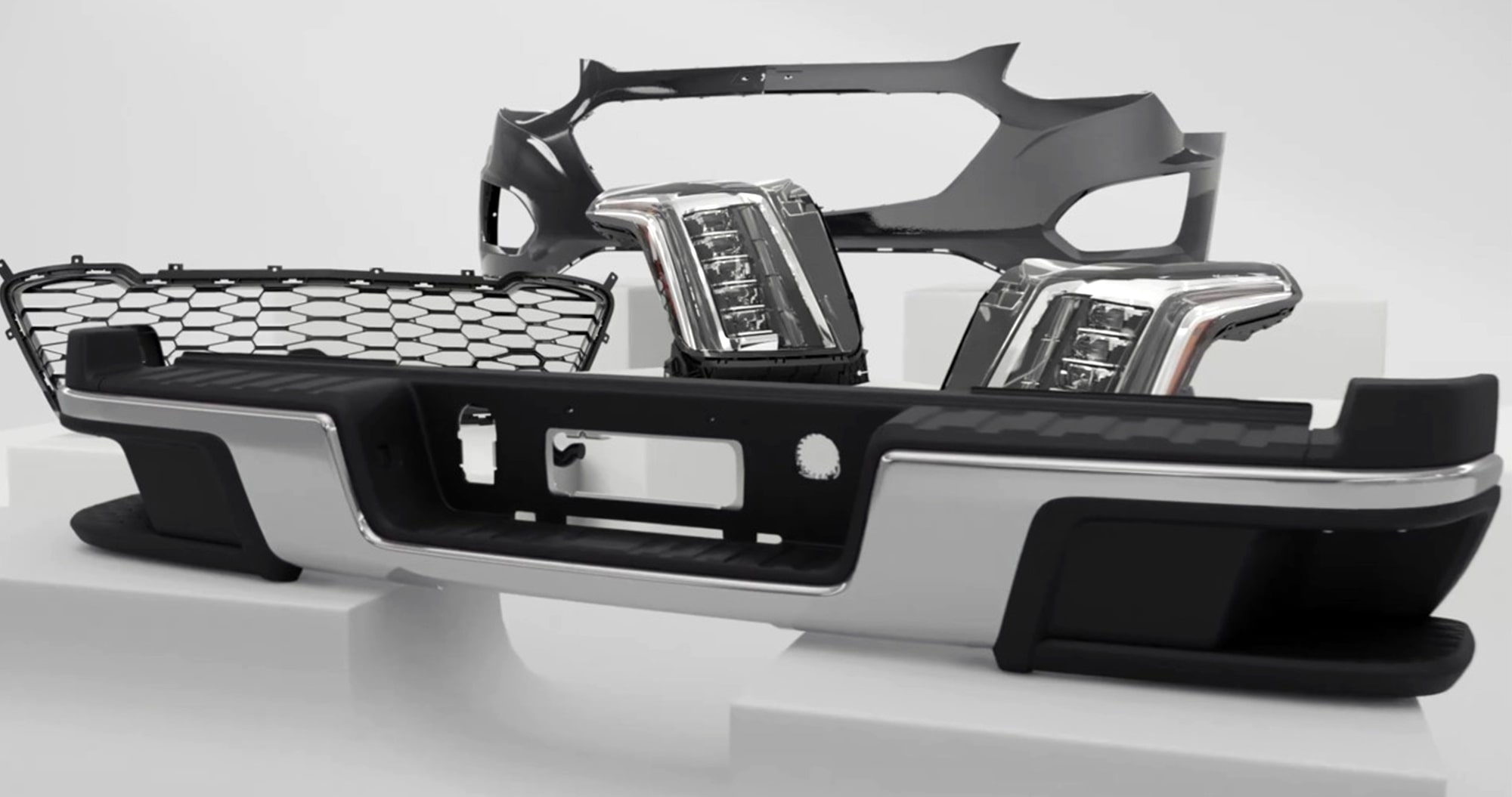 Three Different Black and Silver-Framed Vehicle Headlights Put on Display